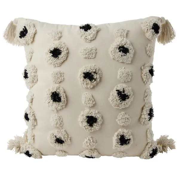Coussin déco tufté pompons beige et noir