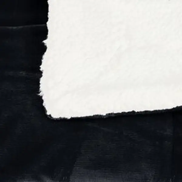 Plaid pilou pilou réversible noir et blanc 127x152cm